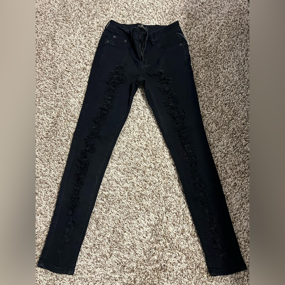 Skinny stretchy ripped black jeans